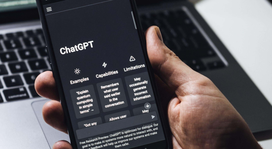 Person interacting with ChatGPT on their smartphone