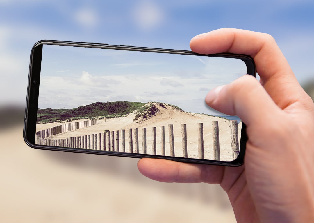 Tips om je smartphone veilig te gebruiken op het strand