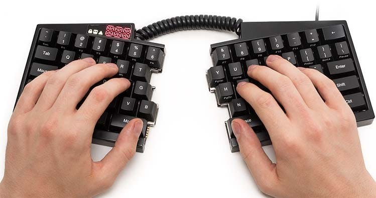 Ultimate Hacking Keyboard in tweeën te breken