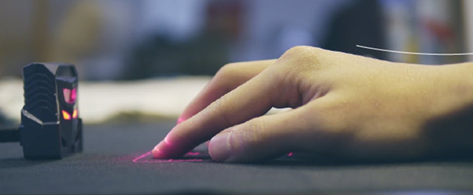 ODiN projecteert muis op je bureau met lasers