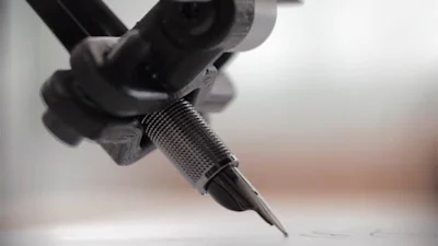 Deze robot schrijft brieven in jouw handschrift