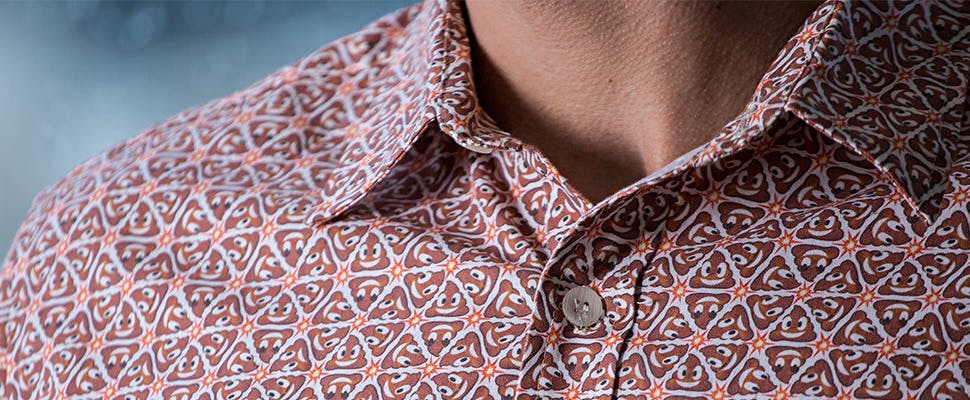 Kijk, een shirt met duizenden lachende drol-smileys