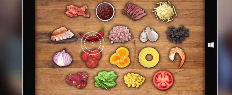 Pizza's te bestellen door naar ingrediënten te kijken