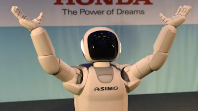 Voetballende Asimo-robot van Honda