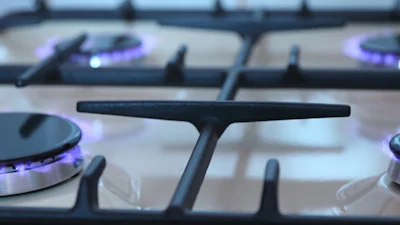 Schoonmaken gaskookplaat