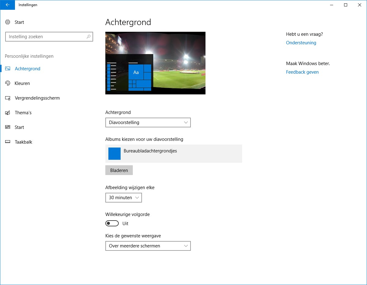Tip 11 Liever meer persoonlijke foto’s, kies dan voor een afbeelding of diavoorstelling als achtergrond.