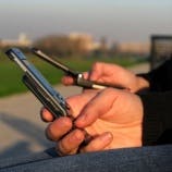 'Gezamenlijk ophogen mobiele tarieven is toeval'