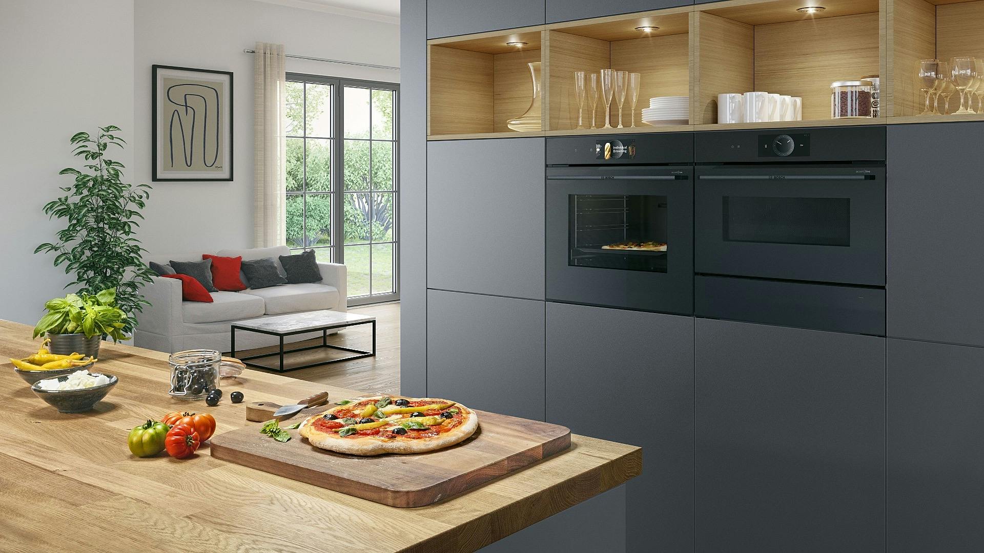 Pizza - kruiden - Zwart - magnetron - microgolfoven - keuken - zetel - huisplant - paprika - pepers - servies - kasten