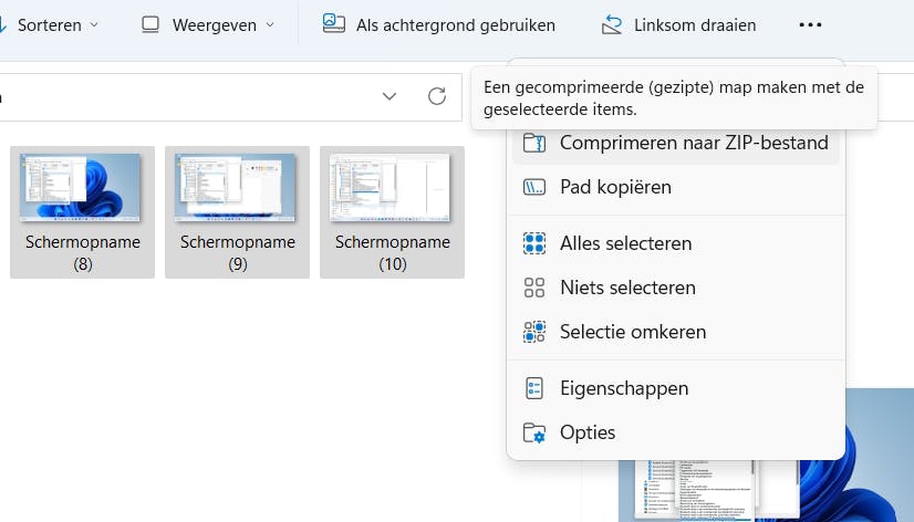 In Windows 11 zit de opdracht om te zippen onder de drie puntjes.