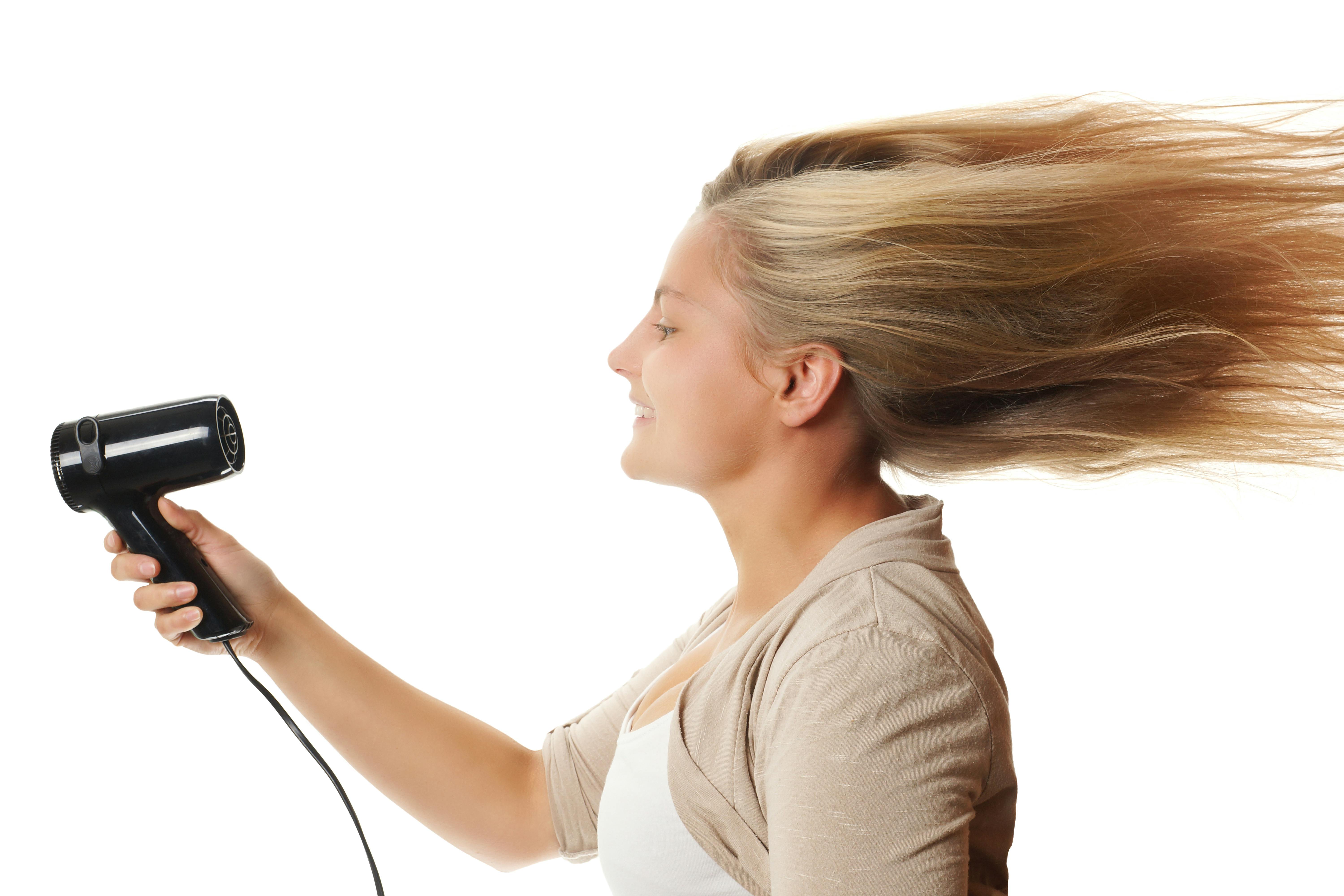 Vrouw die haar fohnt