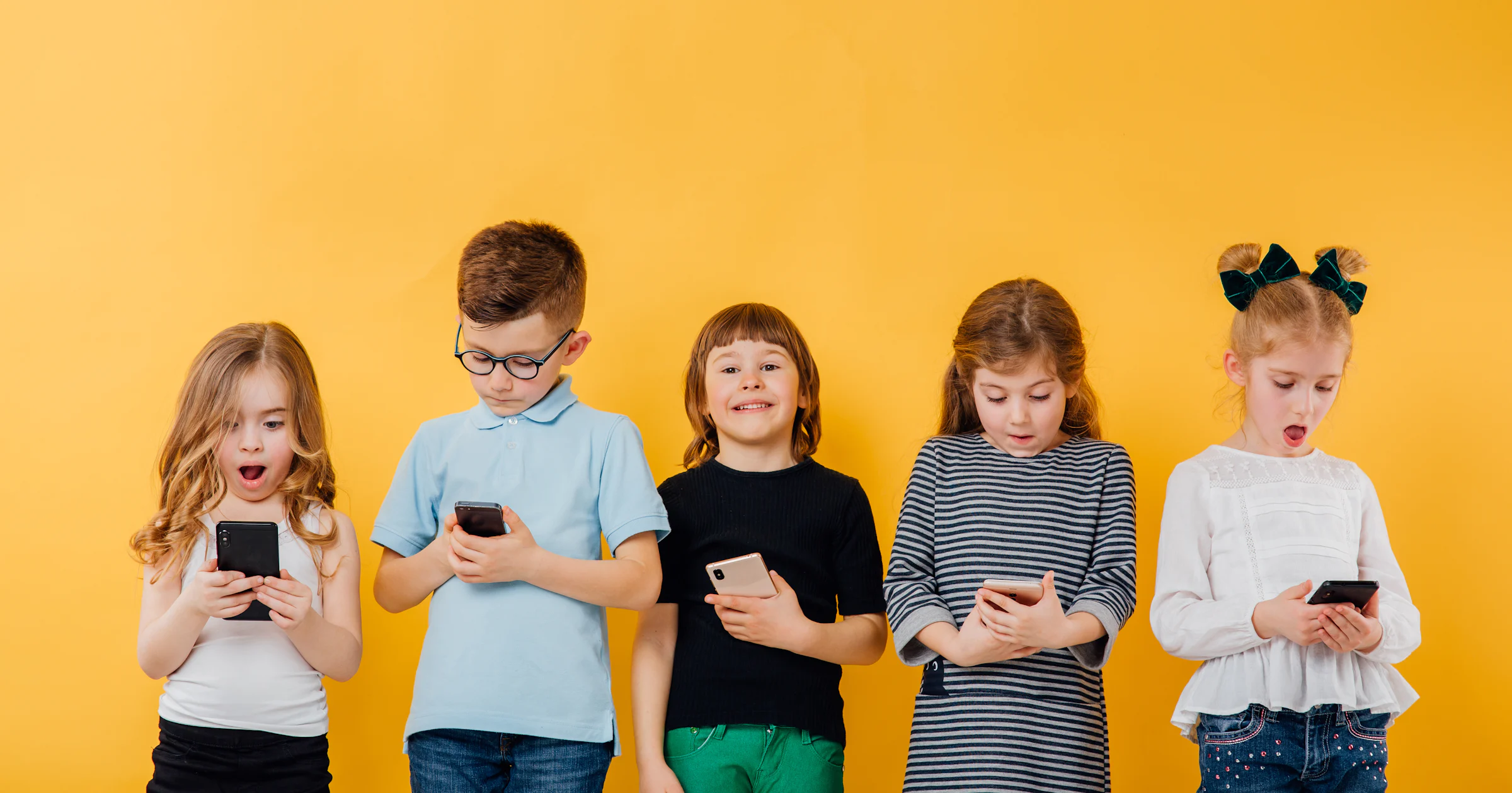 Onverwachte aankopen, ongepaste content: zo beveilig je de schermen van je kinderen