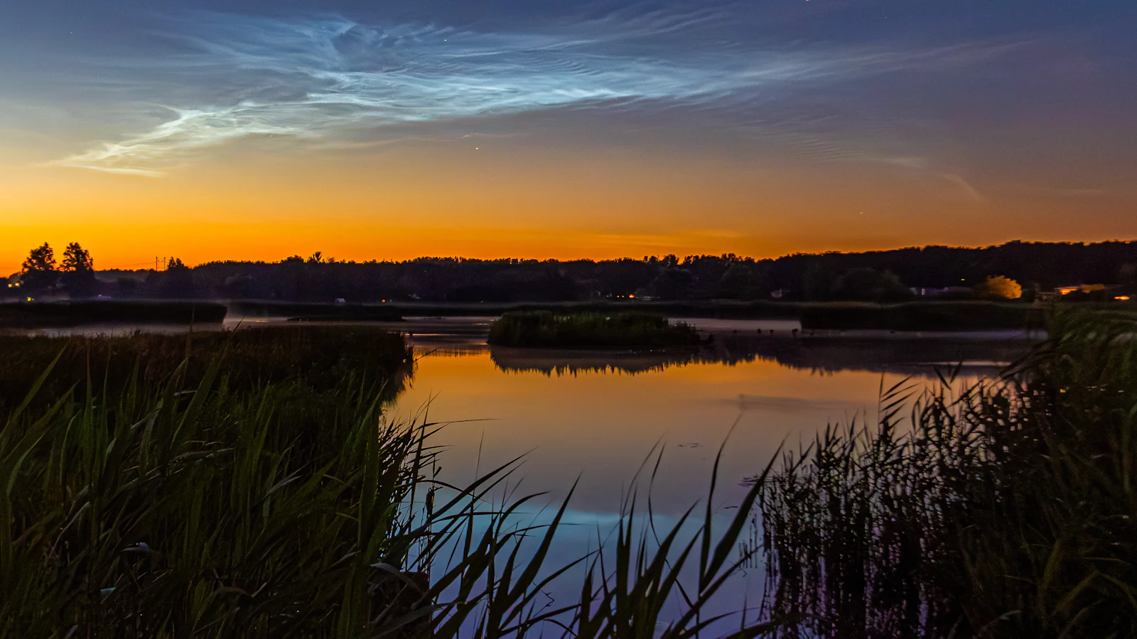 Fotografeer komende avonden lichtende nachtwolken
