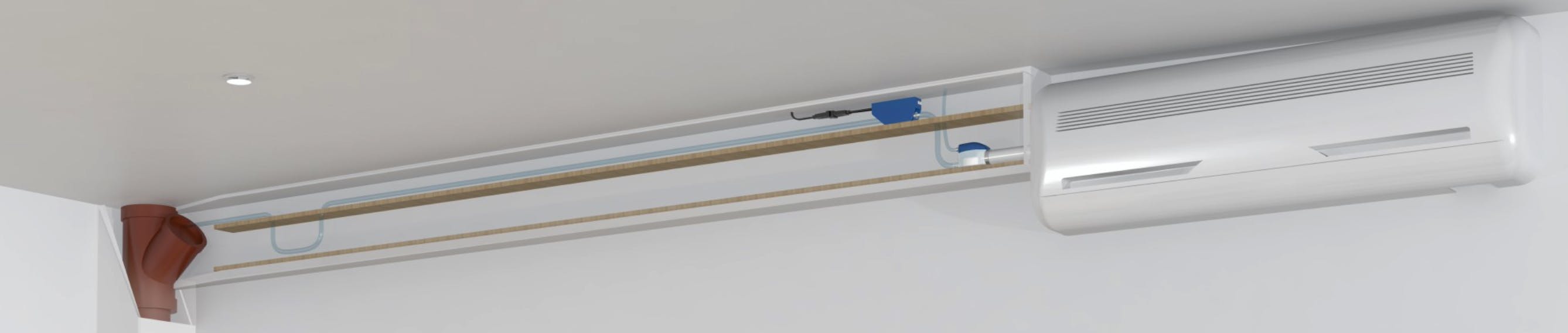 De pomp stuurt het condenswater via de sifon naar de afvoerbuis. (foto: SFA Benelux)