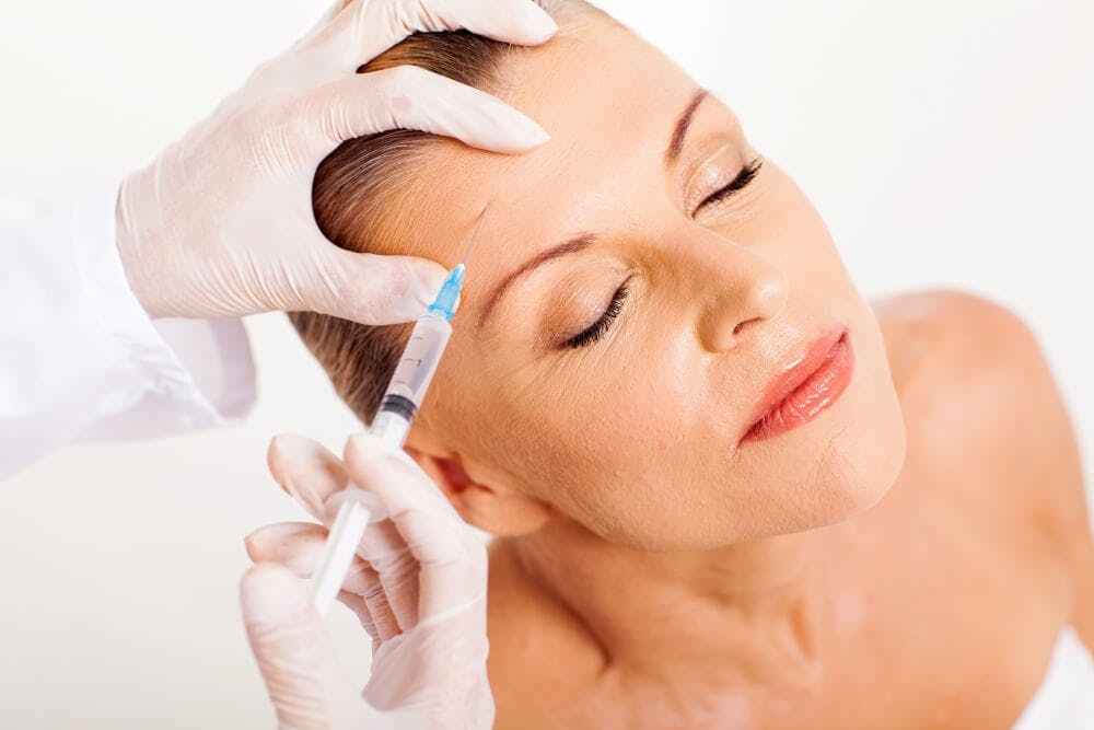 Woman getting an injection