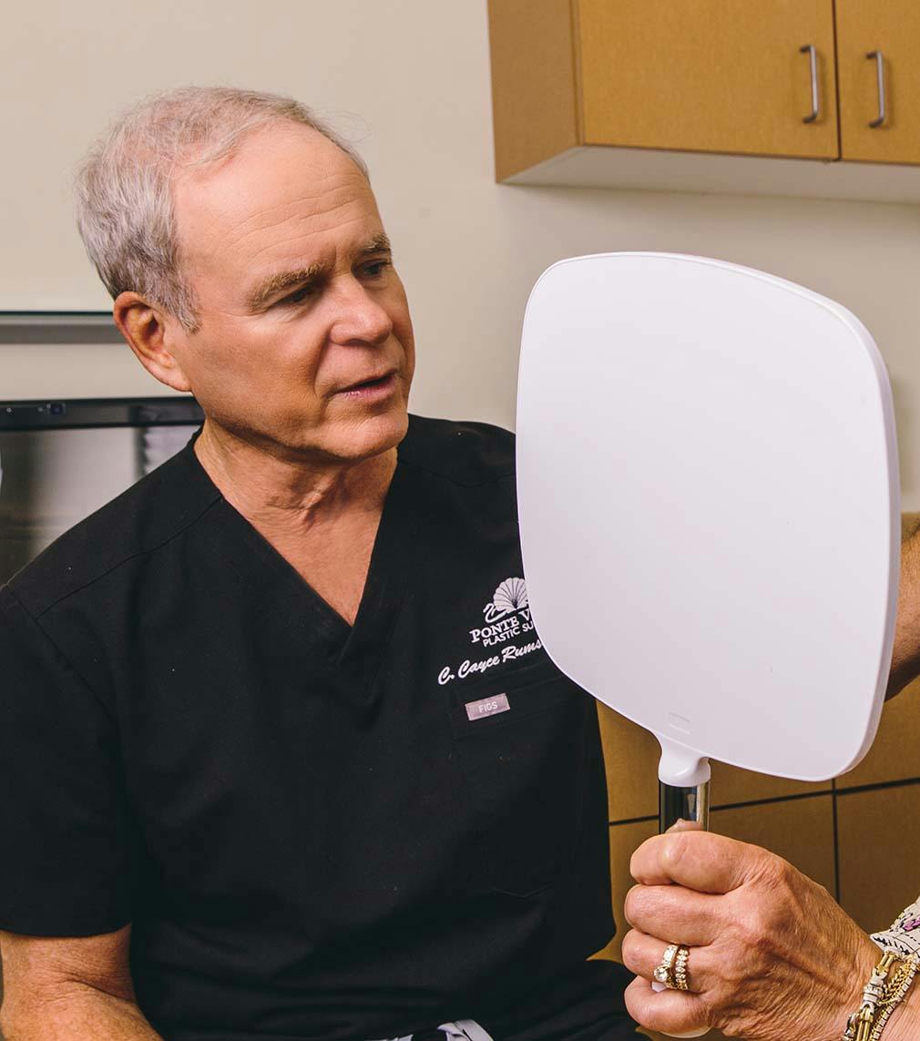 Dr. Cayce Rumsey in patient consultation