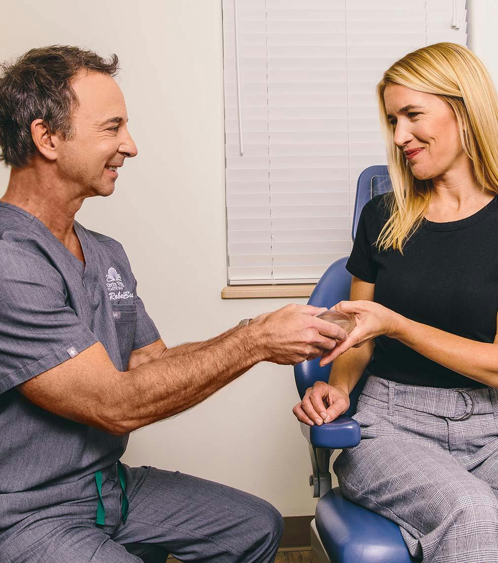 Dr. Robert Burk consulting patient at Ponte Vedra Plastic Surgery
