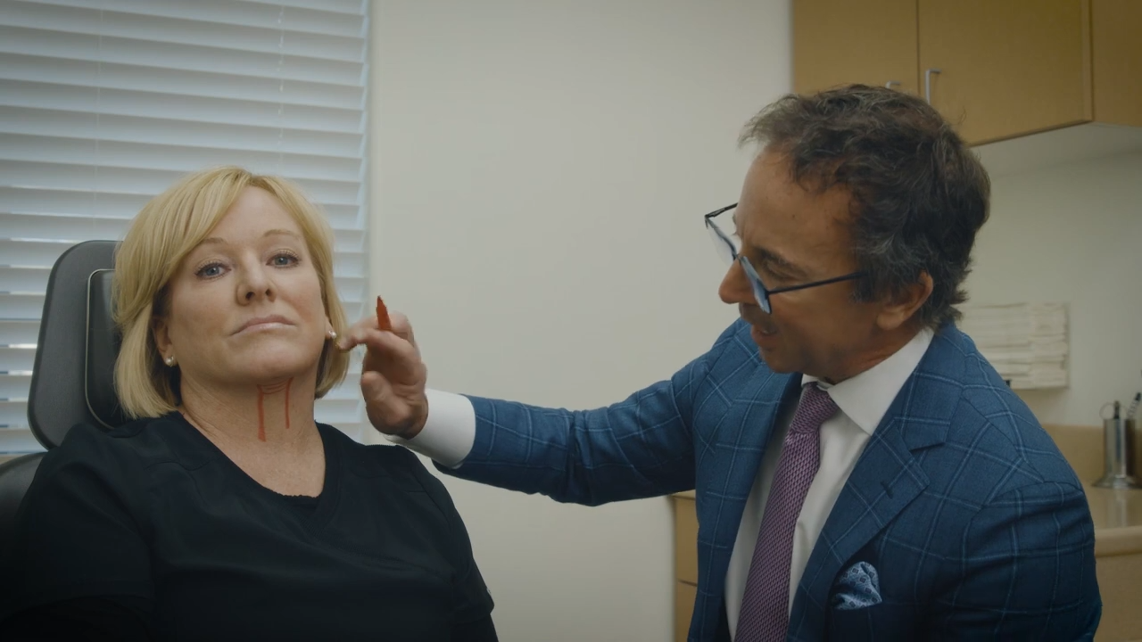 Dr. Robert Burk consulting patient on Facelift