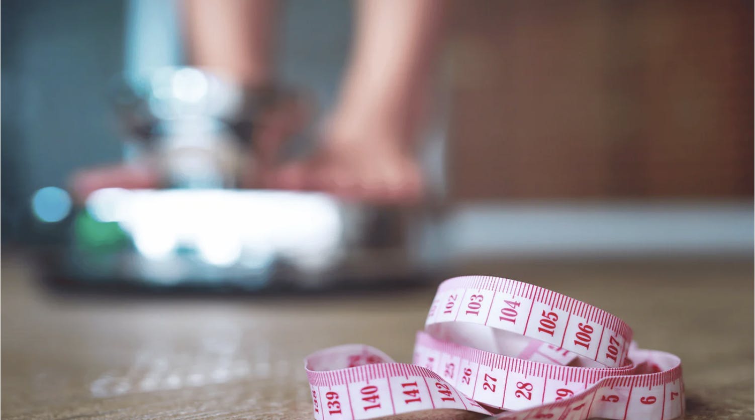 waist measuring tape and weight scale