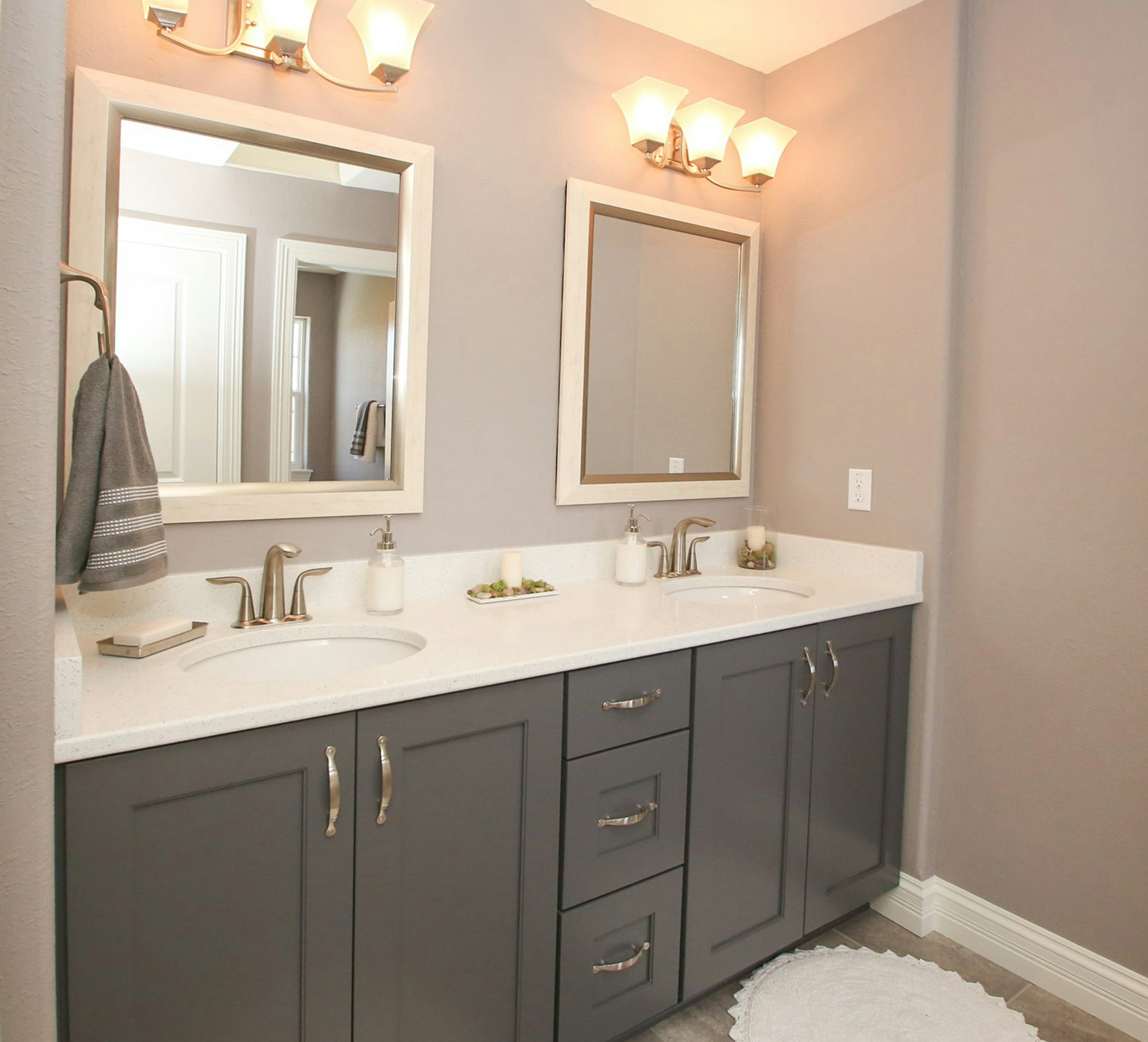 Bathrooms cabinets gallery photo featuring a Tudor, Maple, Cobblestone finished product.