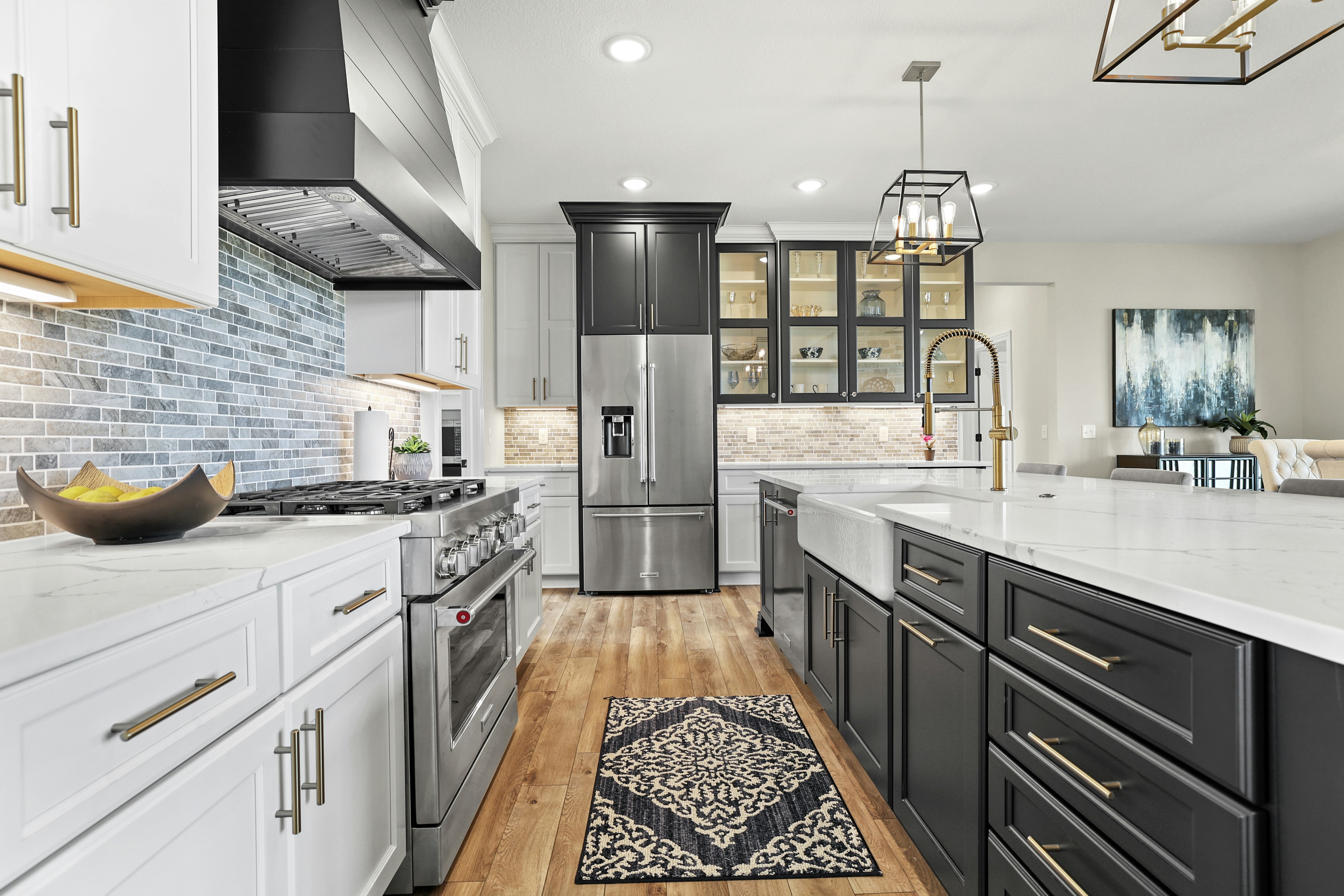 Kitchens cabinets gallery photo featuring a Penbrook, Maple, Macadamia + Raven finished product.