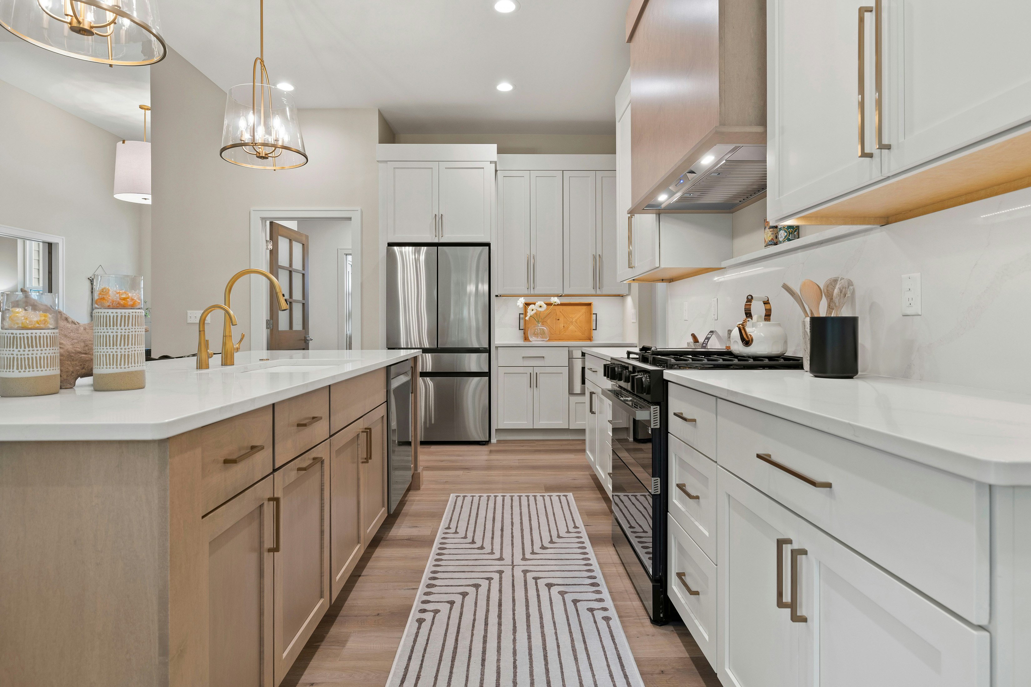 Kitchens cabinets gallery photo featuring a Lexington, Painted Maple + Maple, Macadamia + North Pier finished product.