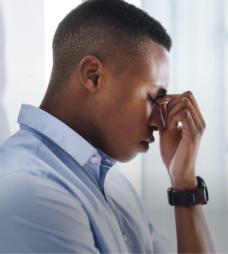 Man holding his nose