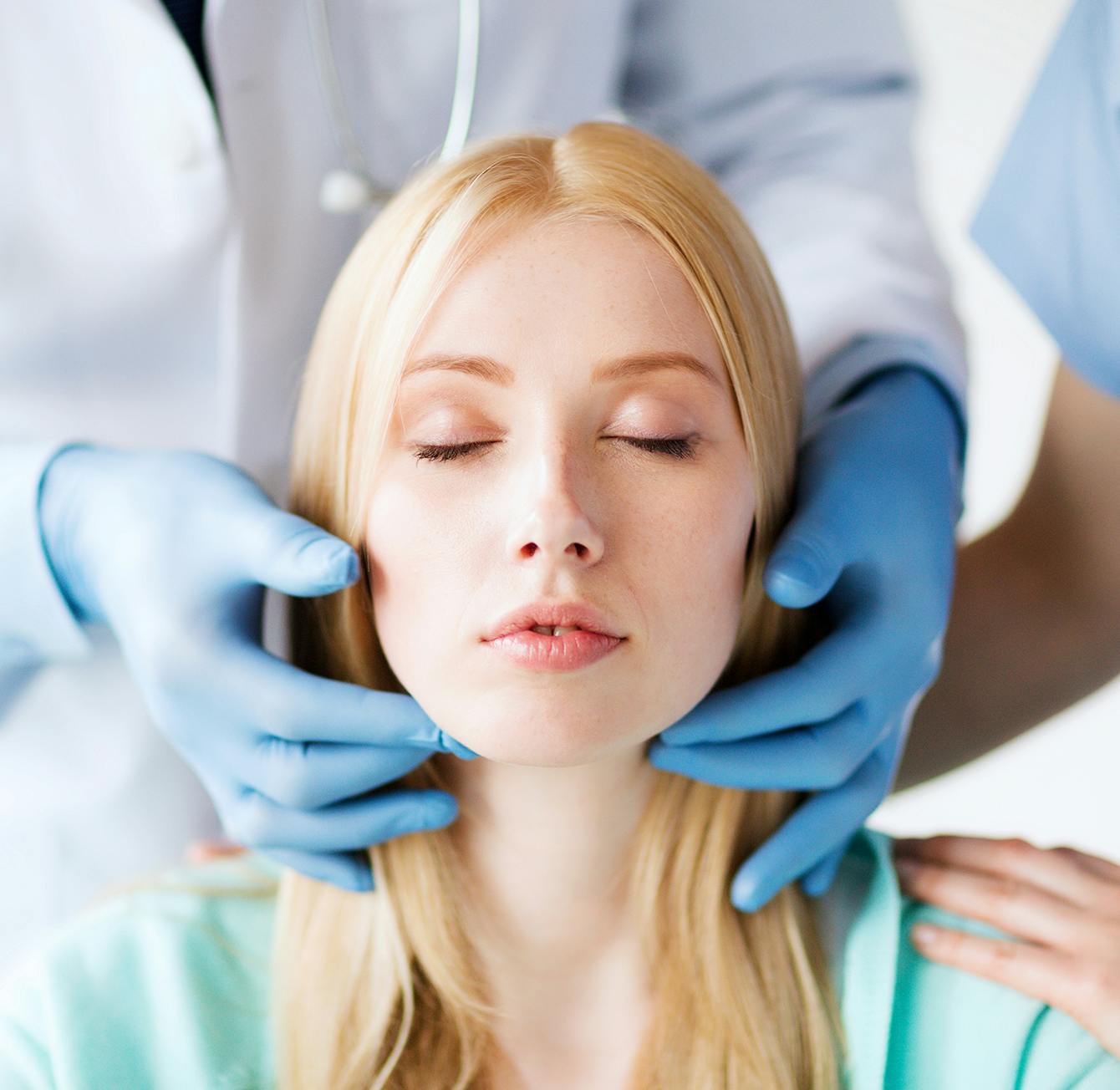 Doctor checking on a patient