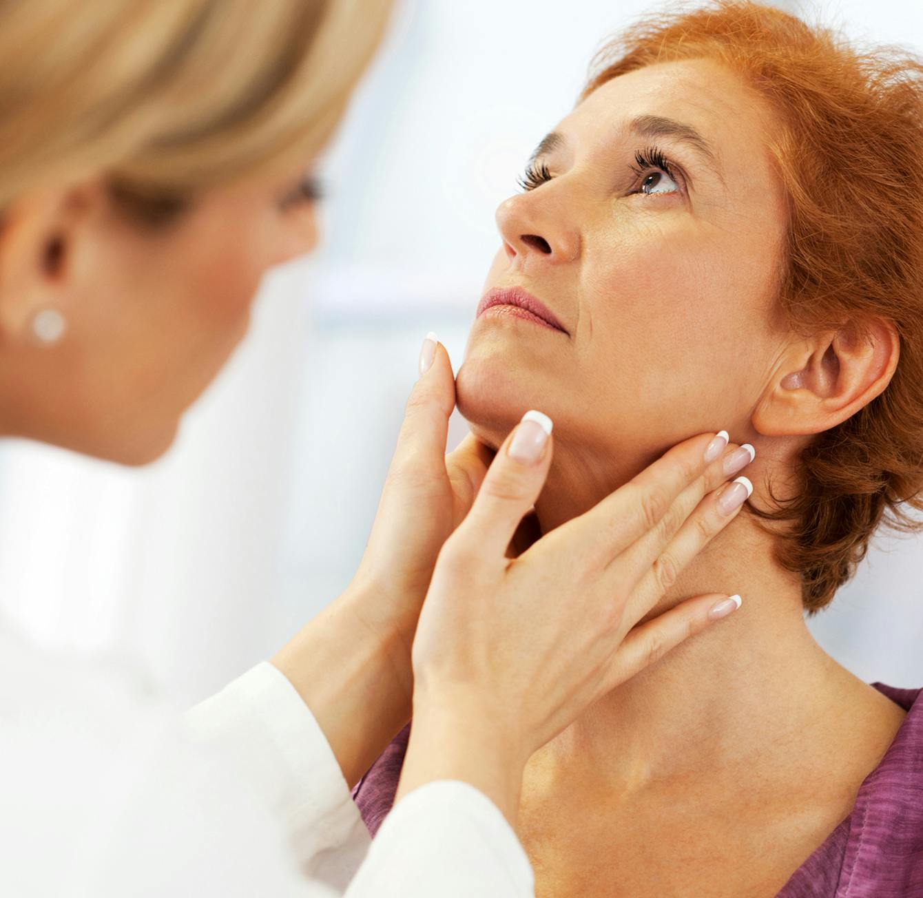 Doctor checking on a patient