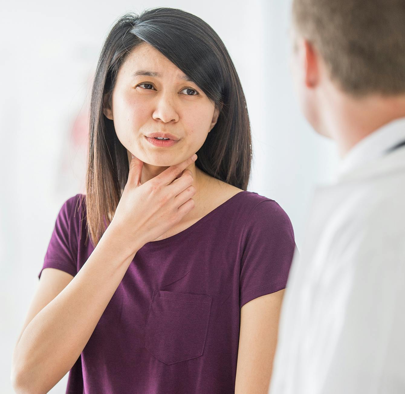 Doctor checking on a patient