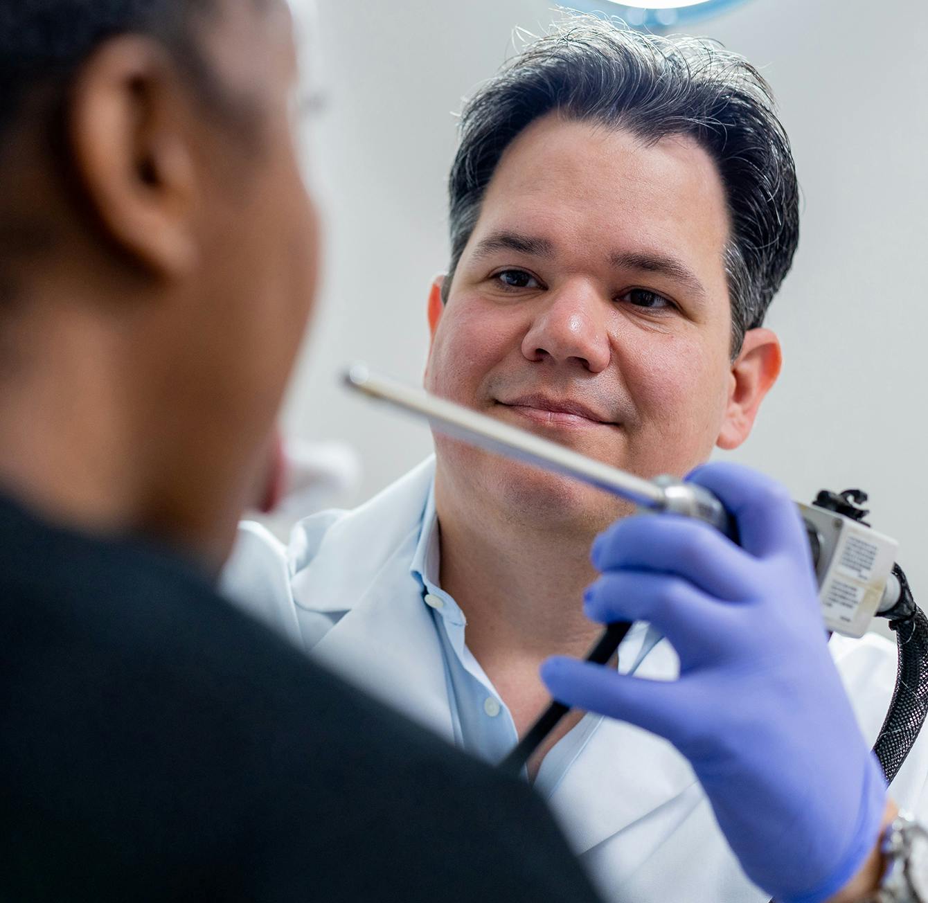 Doctor checking on a patient