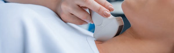 Doctor checking on a patient