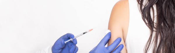 woman recieving allergy shots