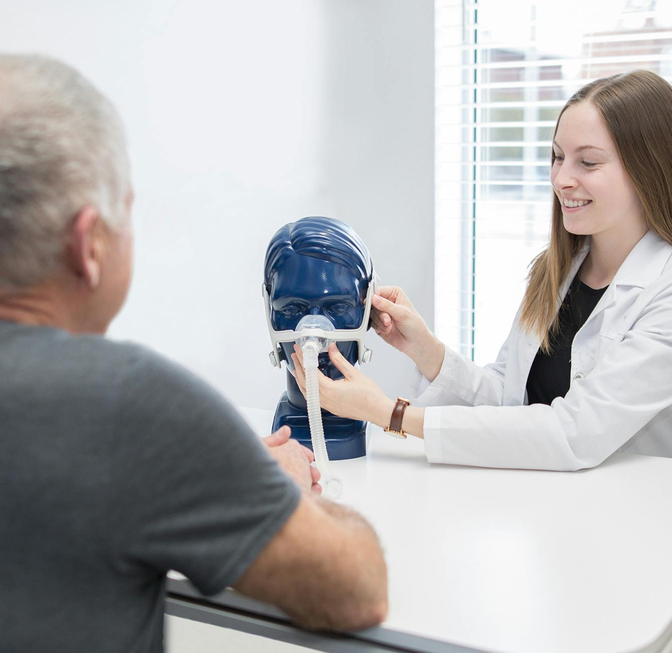Female doctor talking with a patient