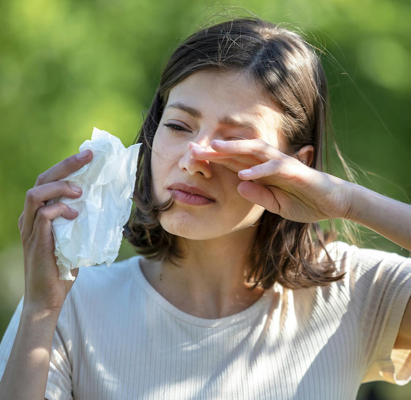 Woman with her hand on her face