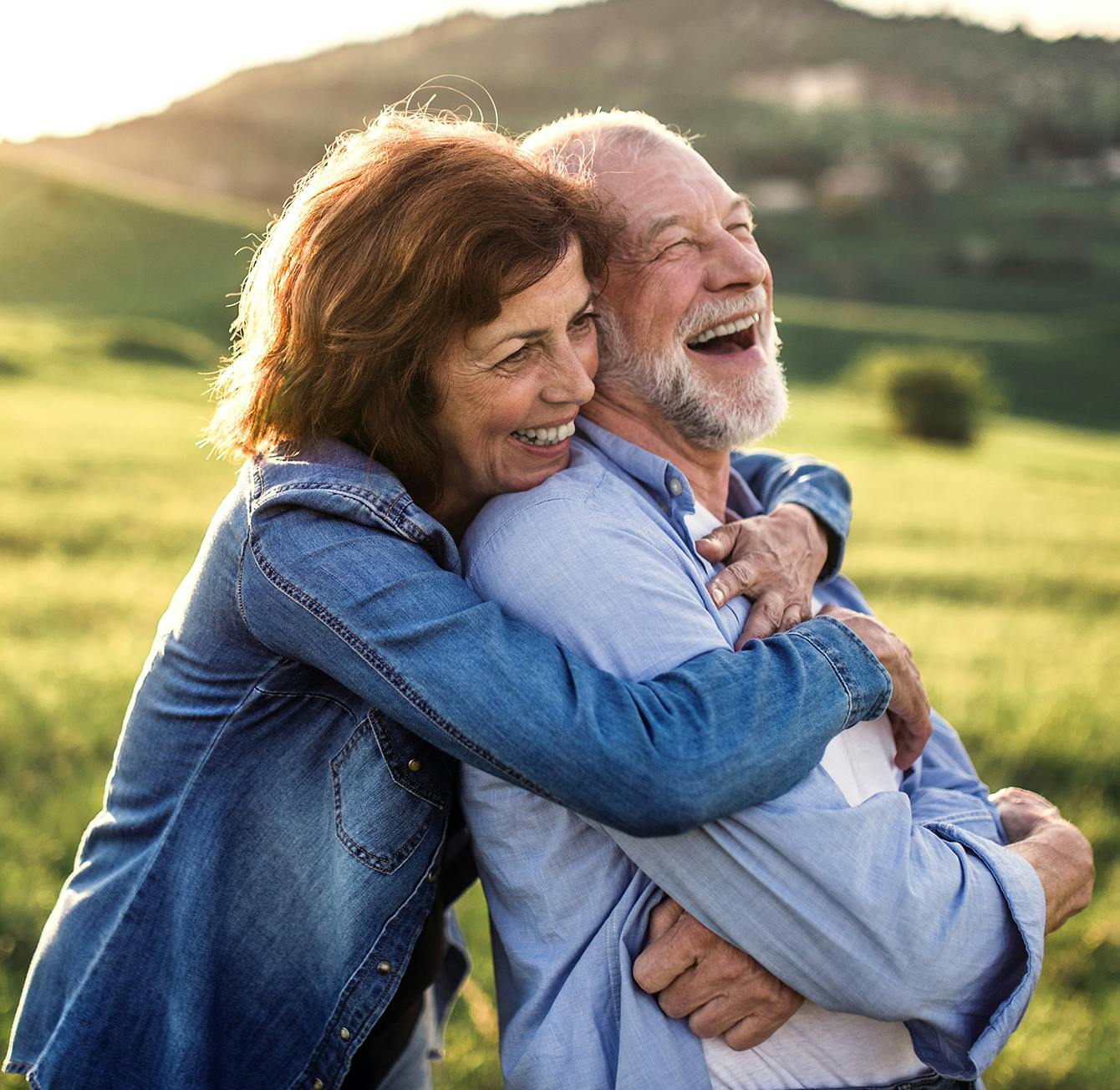 Woman hugging a man from behind