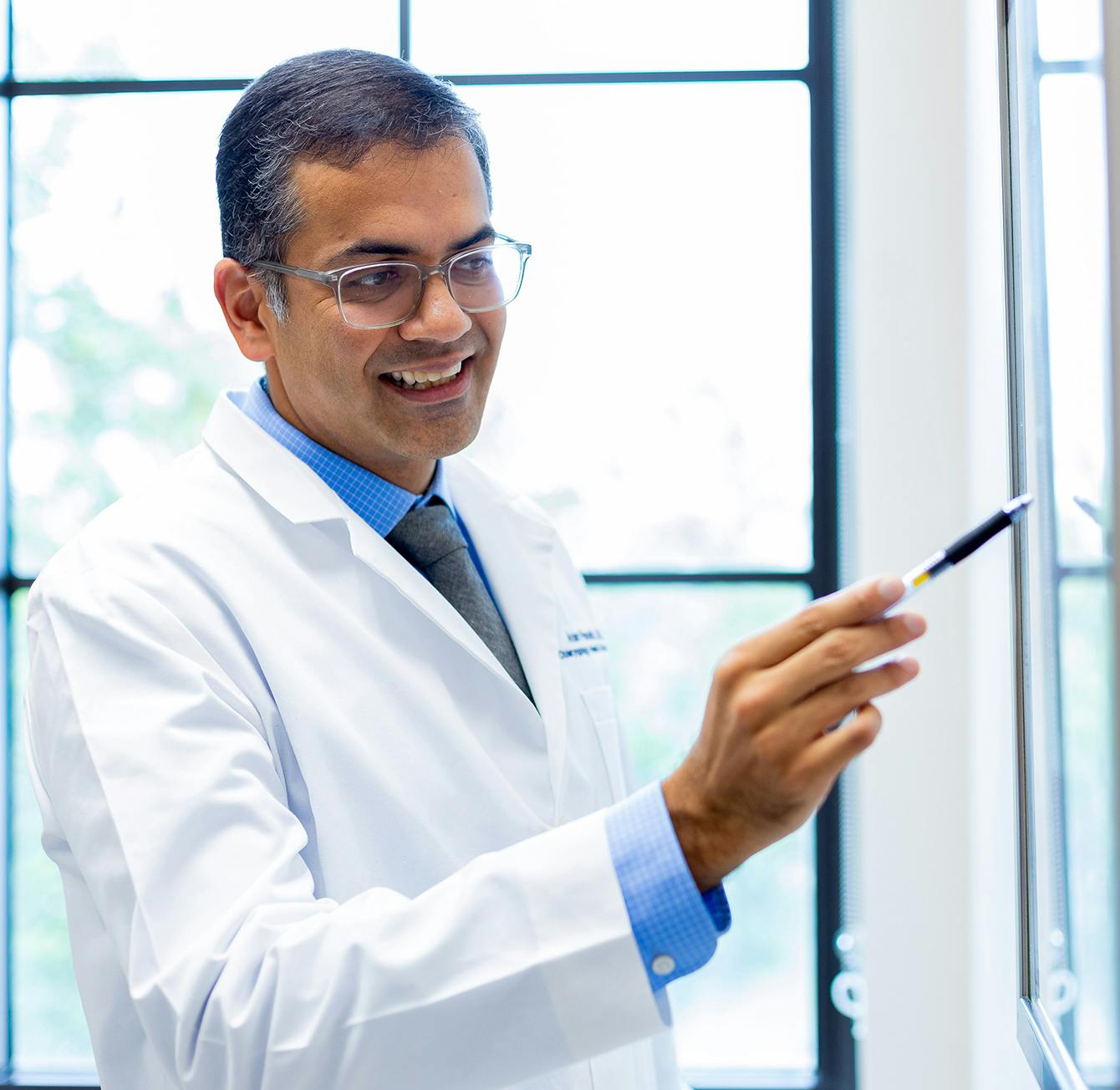 Doctor holding a pen