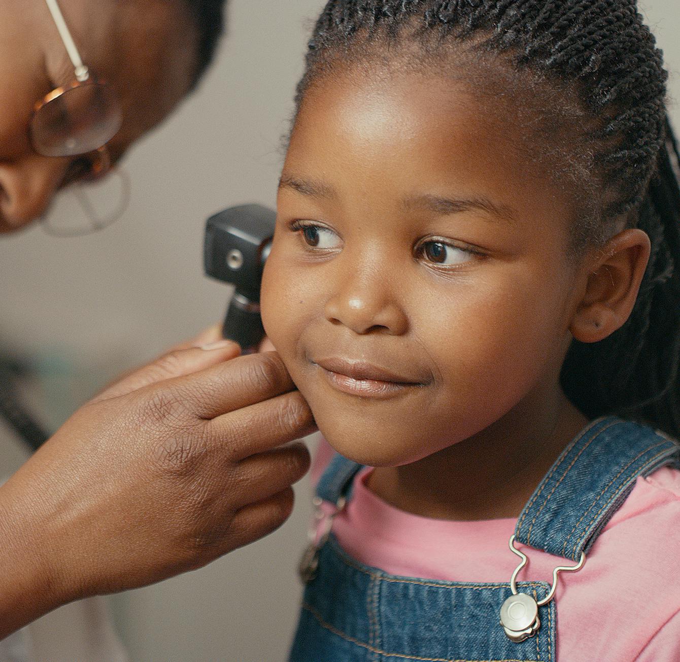 Doctor checking on a patient