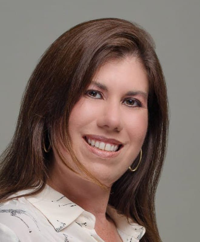 Carmen Orta, AU.D.