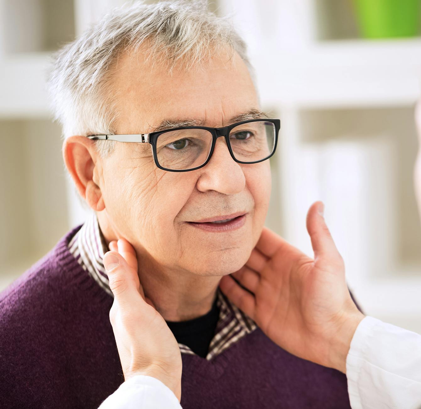 Doctor checking on a patient