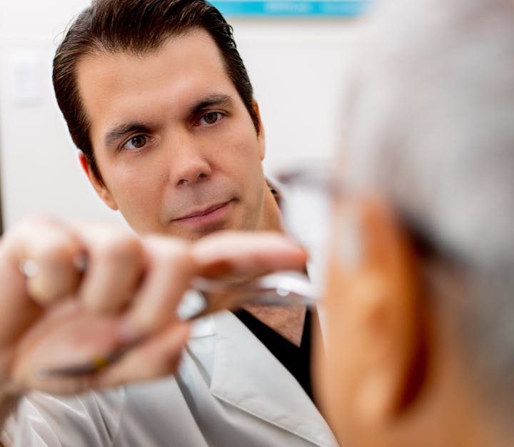 Male doctor examining patient