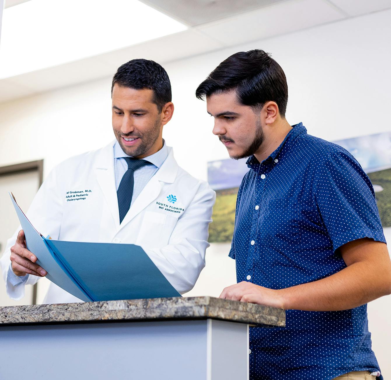 Doctor checking on a patient