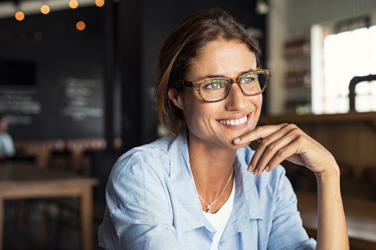 Women With Glasses And A Big Smile