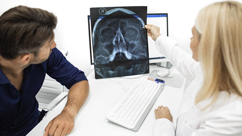 Patient and Doctor looking at an x-ray