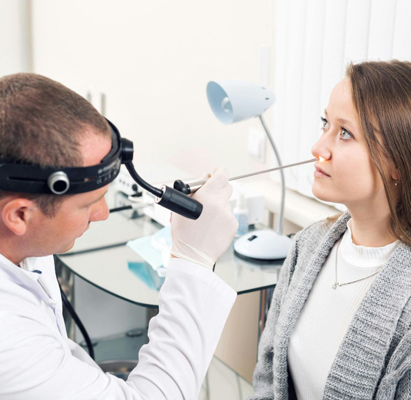 Doctor checking on a patient