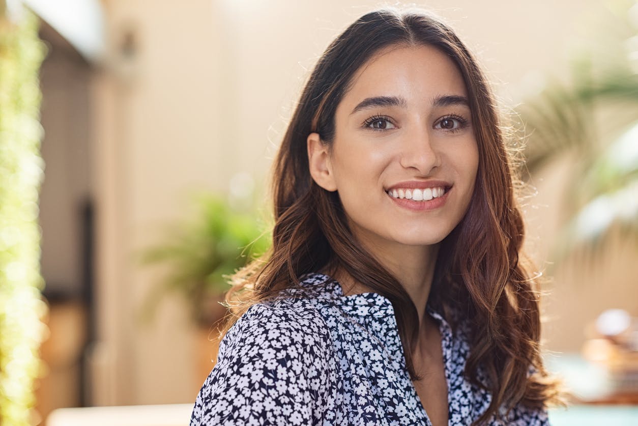 brown-haired woman smiling