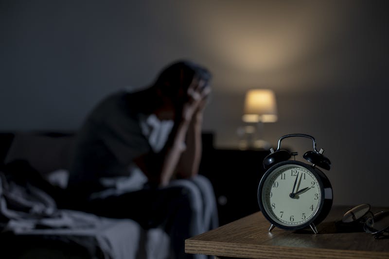 man awake in the middle of the night