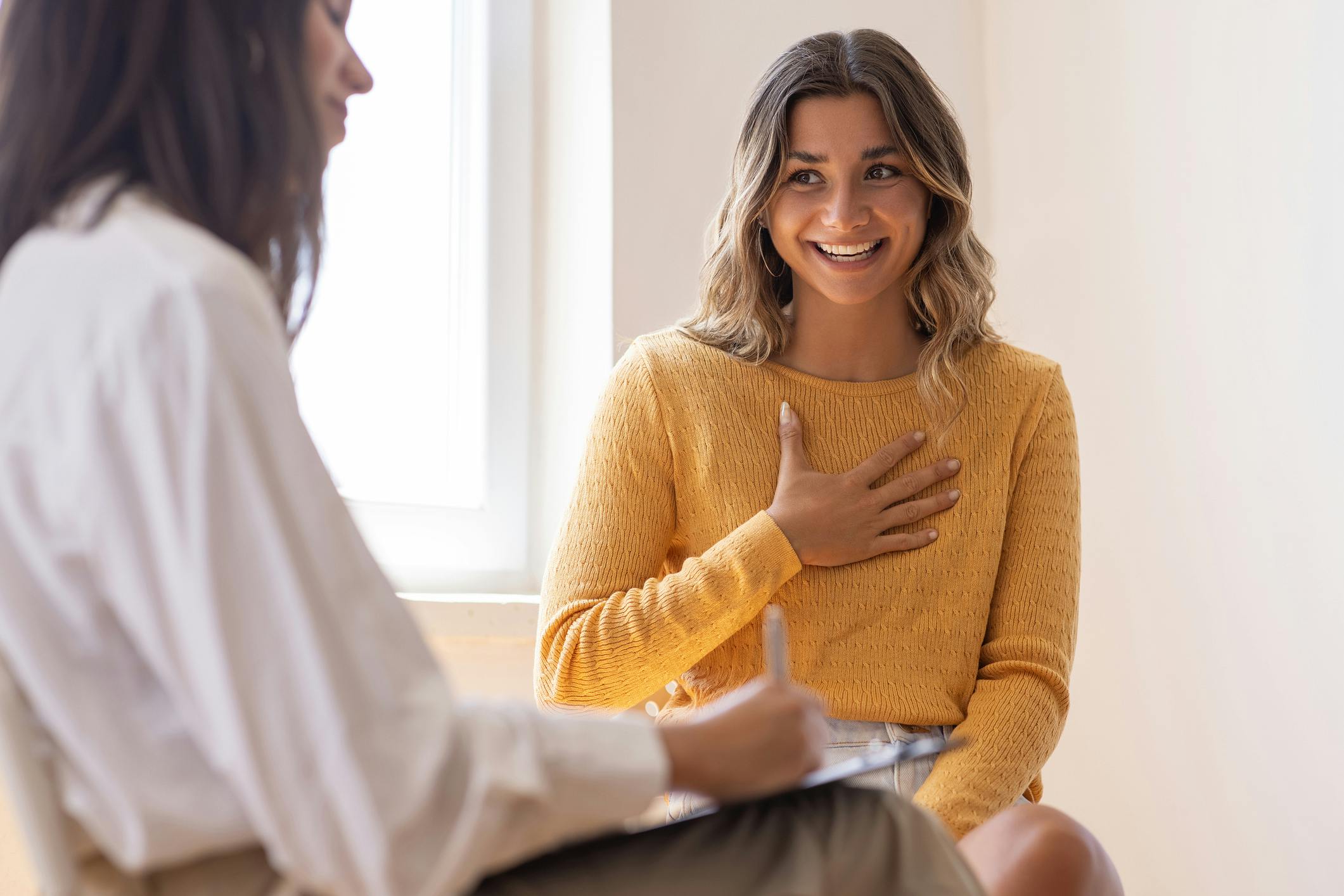 Woman speaking to doctor