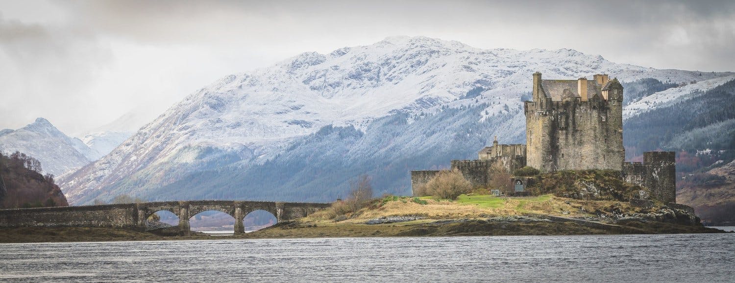 A view of the bridge leading to Eilean Donan castle near the isle of Skye