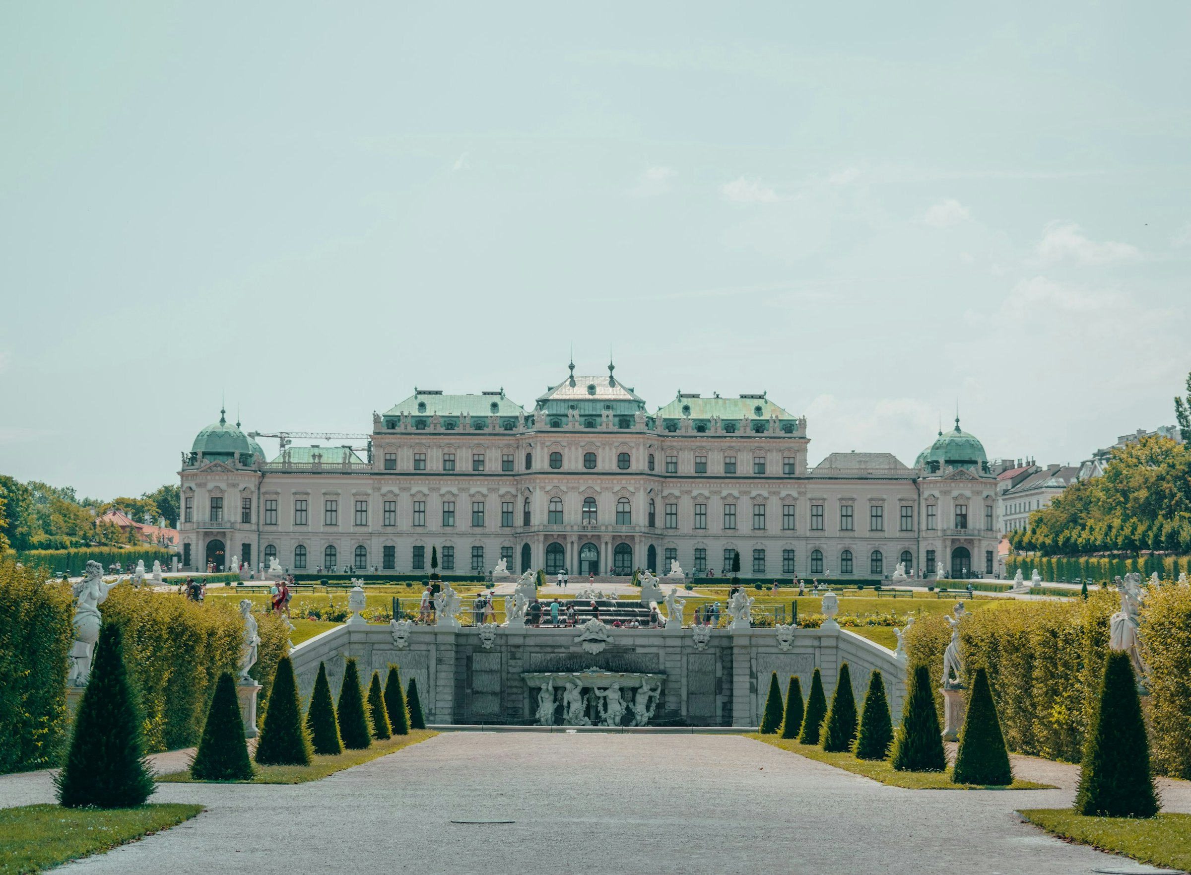 The Upper Belvedere Palace in Vienna, Austria, viewed across its formal gardens and statues.
