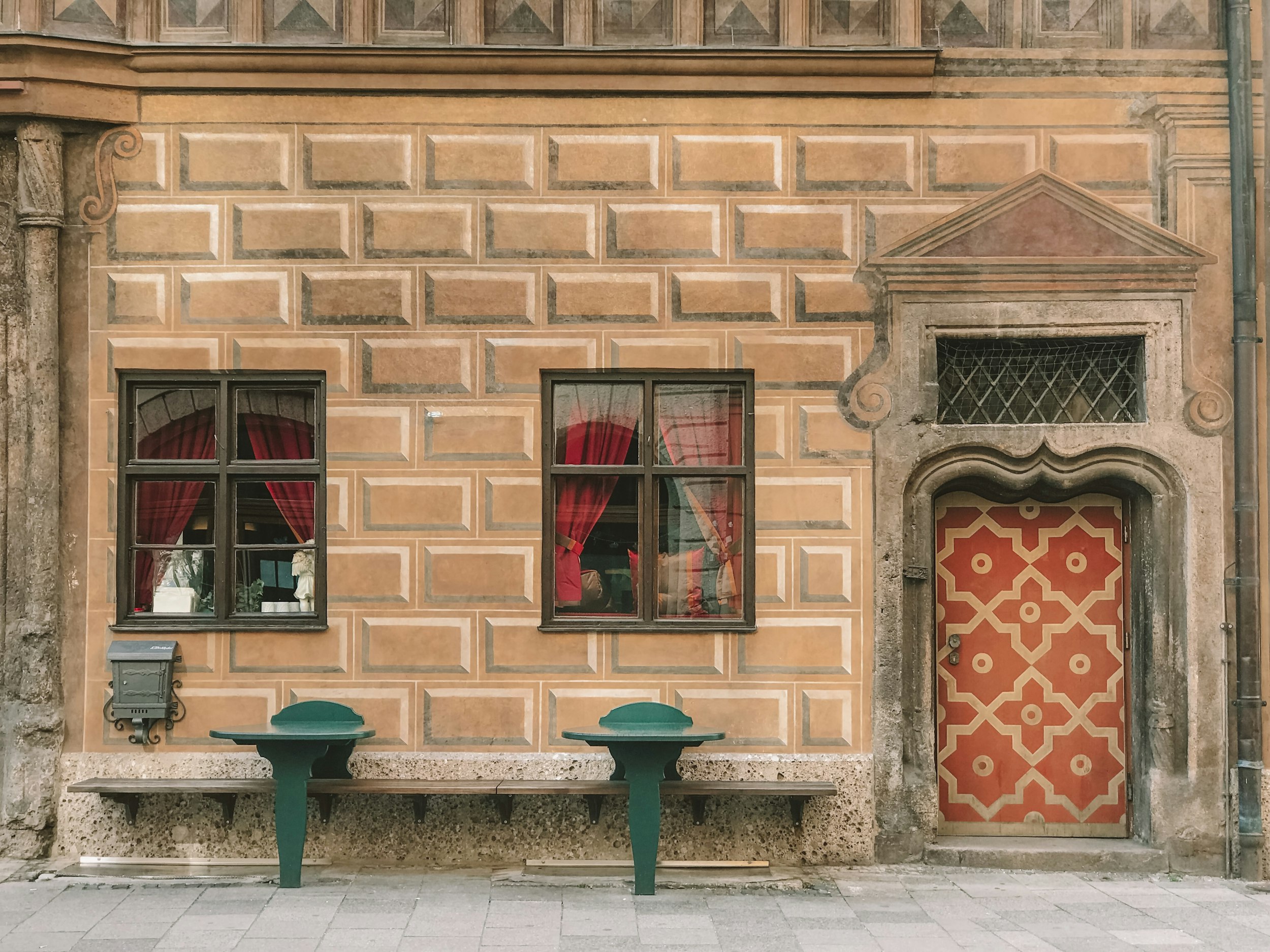 two closed brown framed glass windows